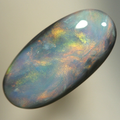 SOLID SEMI BLACK OPAL Glowing with a red Sheen pattern over blue